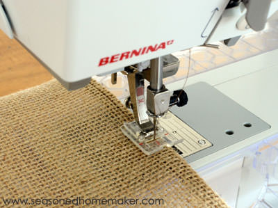 sewing burlap to use for a DIY Thanksgiving table runner